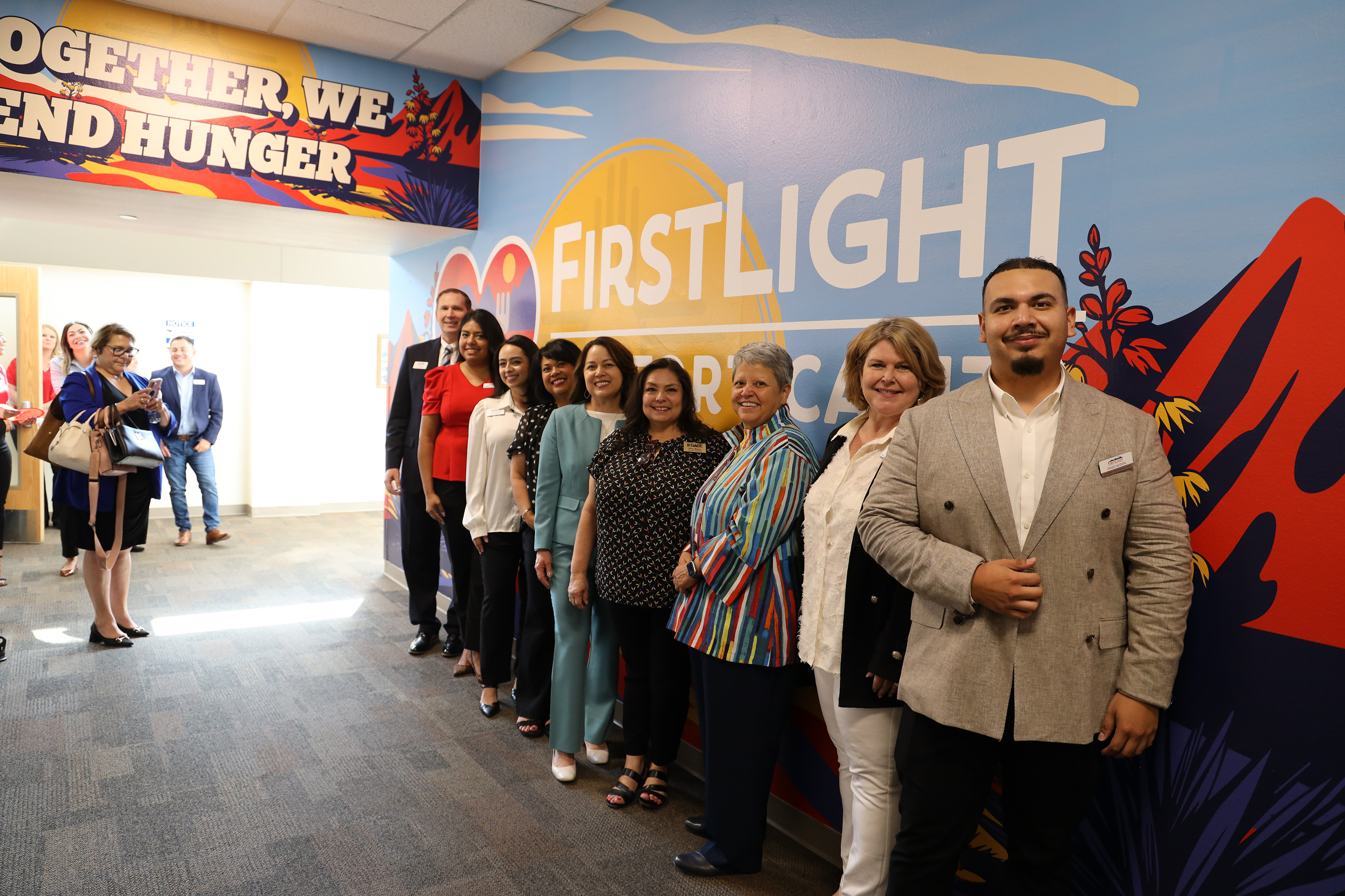Image of DACC staff unveiling Comfort Casita's First Light Federal Credit Union Partnership